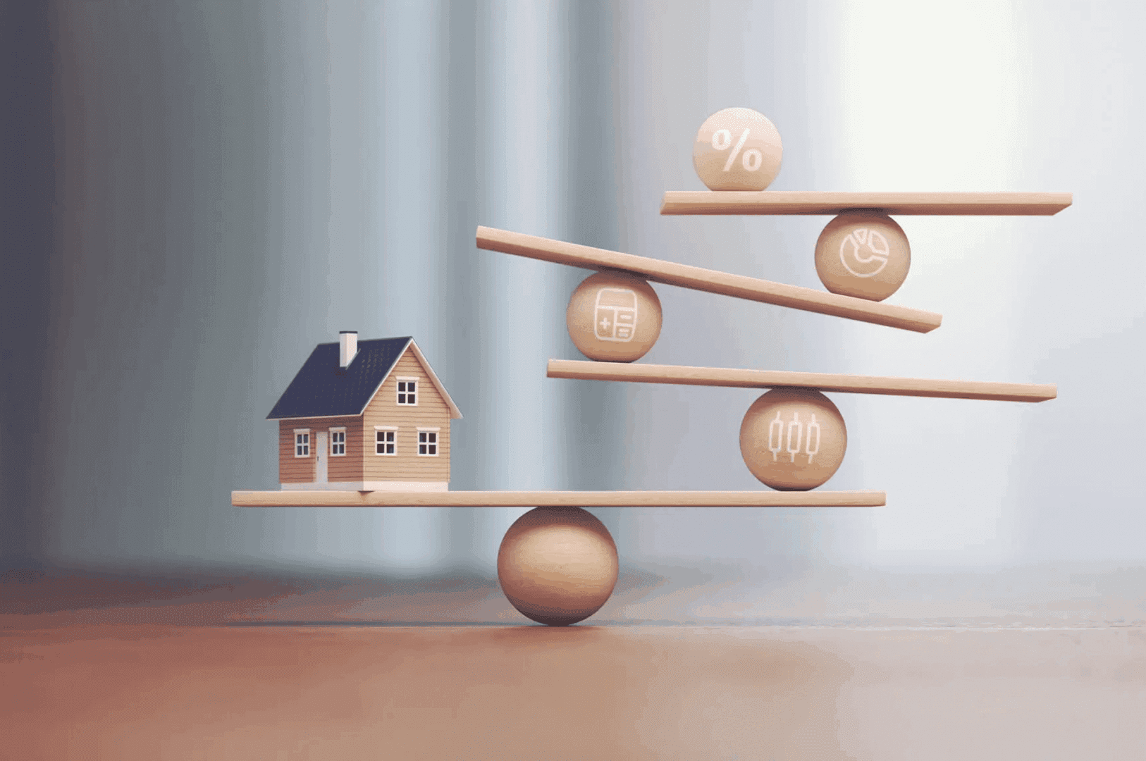 Wooden house balancing on a seesaw with spheres, symbolizing stability and risk.